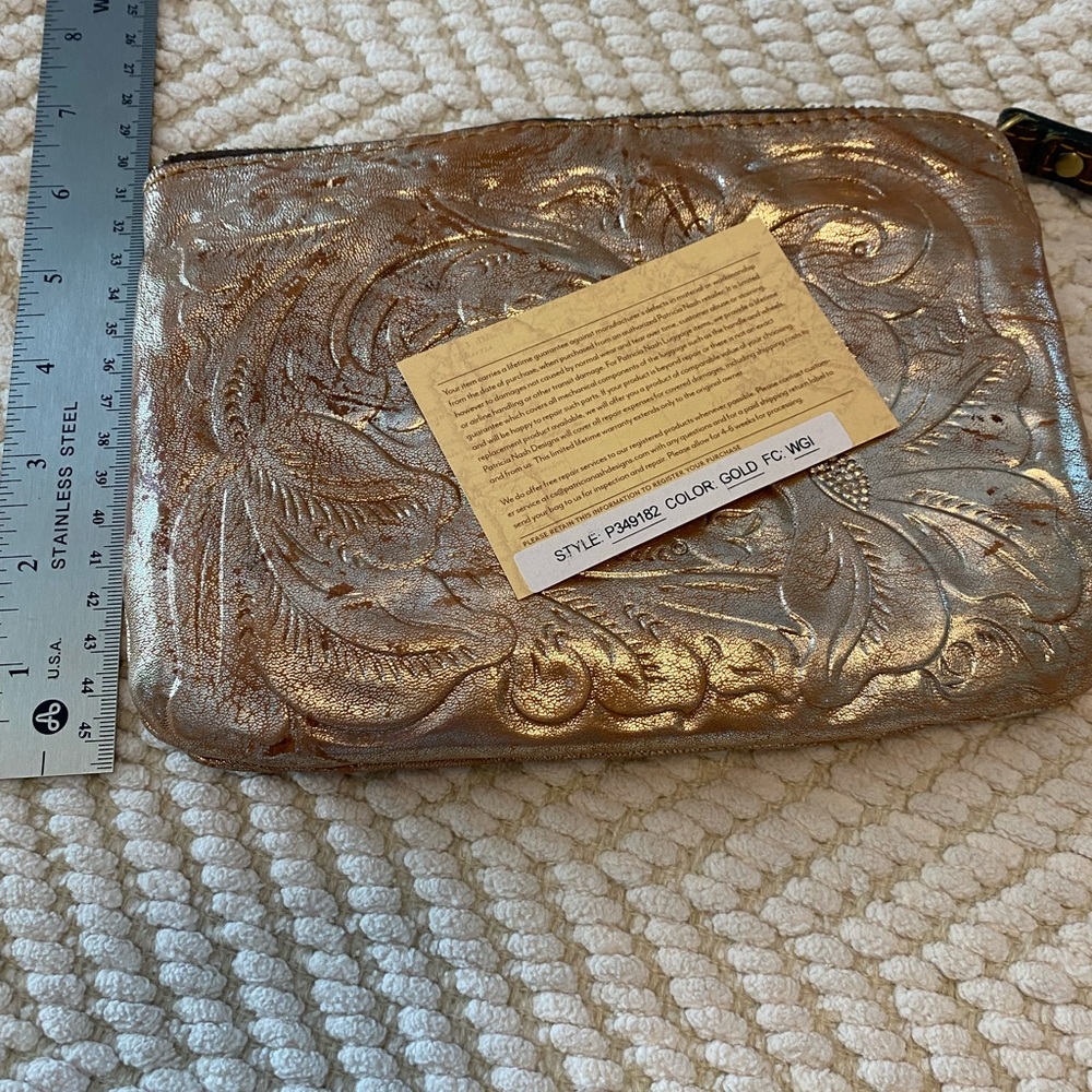 Patricia Nash EUC golden wristlet.